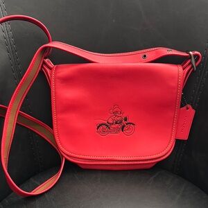 Disney x Coach Red Leather Crossbody Bag with Flap Closure. Never used.